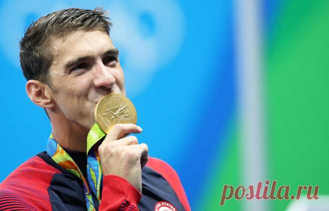 Майкл Фелпс. © EPA/ESTEBAN BIBA. РИО-ДЕ-ЖАНЕЙРО, 10 августа. /ТАСС/. Самый титулованный спортсмен в истории Олимпийских игр американский пловец Майкл Фелпс обновил собственный рекорд по количеству золотых медалей Игр, победив на дистанции 200 метров баттерфляем на ОИ-2016 в Бразилии. Подробнее на ТАСС: http://tass.ru/sport/3524437  |  ТАСС: Спорт - Майкл Фелпс стал 20-кратным олимпийским чемпионом