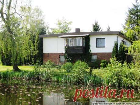 Käuferprovisionsfrei: Großzügiger Bungalow auf parkähnlichem Teichgrundstück Einfamilienhaus Schalkholz (28YC64G)