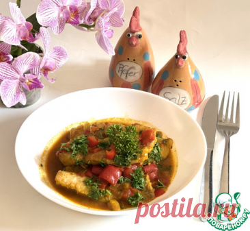 Карри с рыбой и овощами. Благодаря сочетанию нежного рыбного филе и насыщенного, ароматного томатного соуса, это блюдо является не только обыденным блюдом, но и праздничным. Соус, насыщенный специями, вкусной смеси перца, тмина и кориандра, окутывает рыбу своим ароматом.