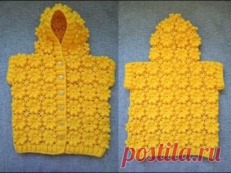 "Детский жилет с капюшоном" (Children's vest with hood) В видеоуроке показано, как связать детский жилет с капюшоном, который выполнен из пряжи "Кроха" (20% шерсть, 80 % акрил), крючком №2. Жилет связан в технике ...
