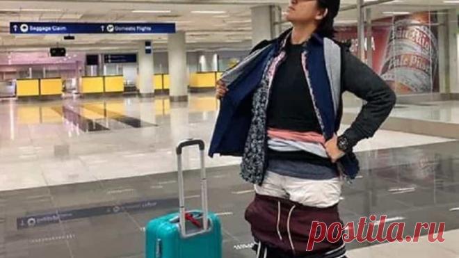 Mulher evita multa por excesso de bagagem ao vestir 2,5 quilos de roupa  