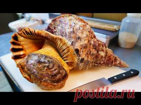 Японская уличная еда - огромная раковина сашими Окинава морепродукты Япония