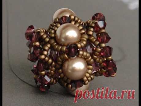 How to make a beaded bead - beading tutorial What you'll need: 15/0s Matte Mt Dk Bronze; 11/0s Matte Mt Dk Bronze; 6mm Swarovski Bronze pearls; 4mm Swarovski...