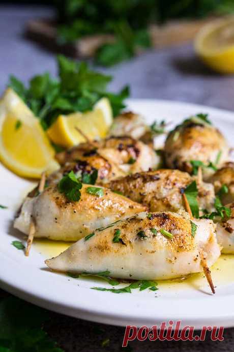 Stuffed calamari in lemon butter sauce - Viktoria's Table Stuffed calamari in lemon butter sauce - these delicious calamari bites are stuffed with creamy tuna filling, then cooked in a luscious tangy lemon butter sauce, with capers, garlic and lots of fresh parsley.