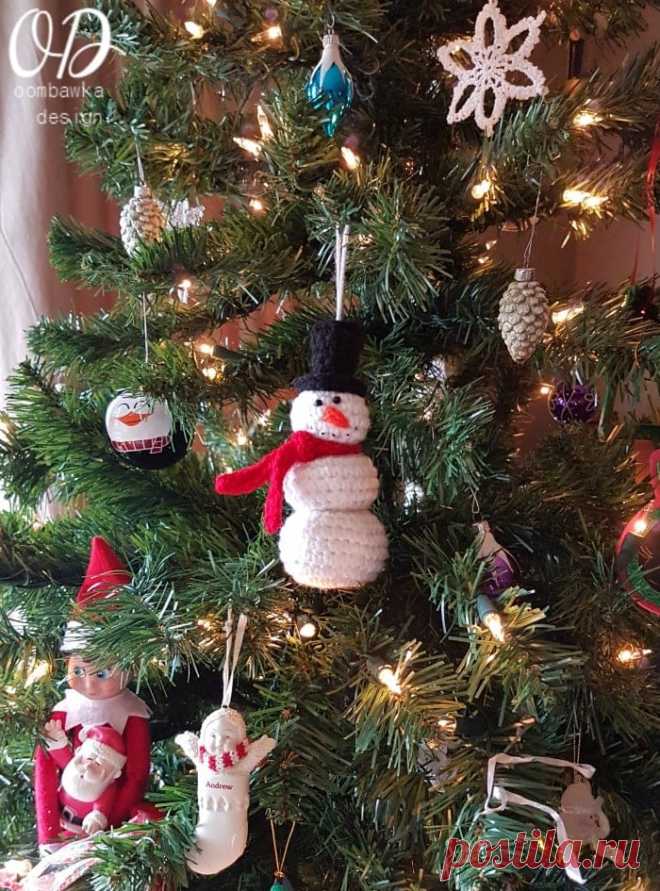 Free Crochet Snowman Ornament Pattern Free Crochet Snowman Christmas Ornament Pattern. Crochet this cute winter snowman with this free pattern and hang him from your tree, gift bag or present.