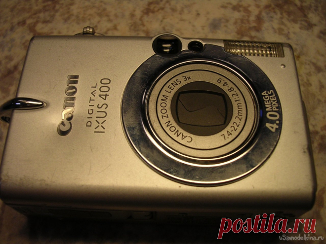 Фотоаппарат CANON IXUS 400 с «рычанием» Принес в ремонт мальчик аппарат. В квитанции записано «следы потертости, на фронтальной панели вмятина в районе фирменной надписи». Неисправности со слов клиента «при включении рычит»! Очередной пациент у меня на столе, сейчас посмотрим в каком месте «рычит» маленькая железячка. Подтягиваю