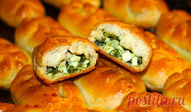 Печеные пирожки с луком и яйцом 
Рецепт приготовления вкусных печеных пирожков с луком и яйцом.