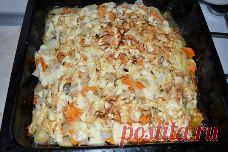 Запечённый хек с овощами в духовке