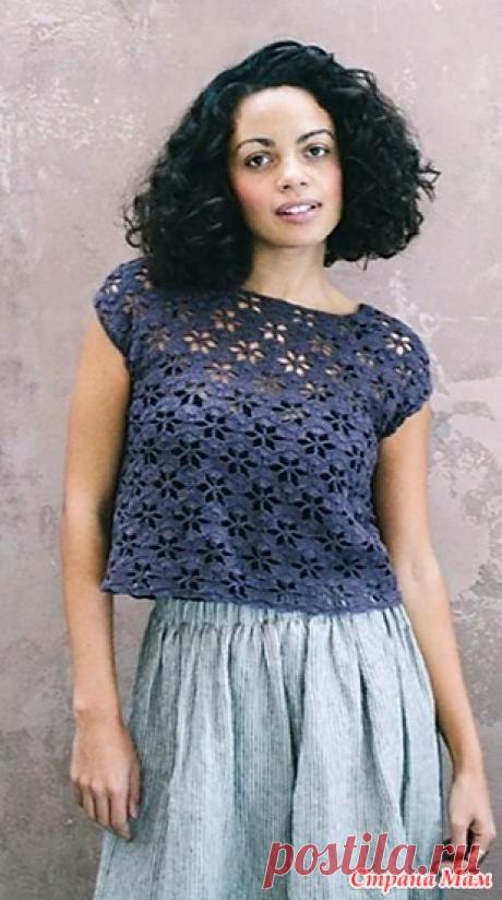 Женственный топик сиреневого цвета.