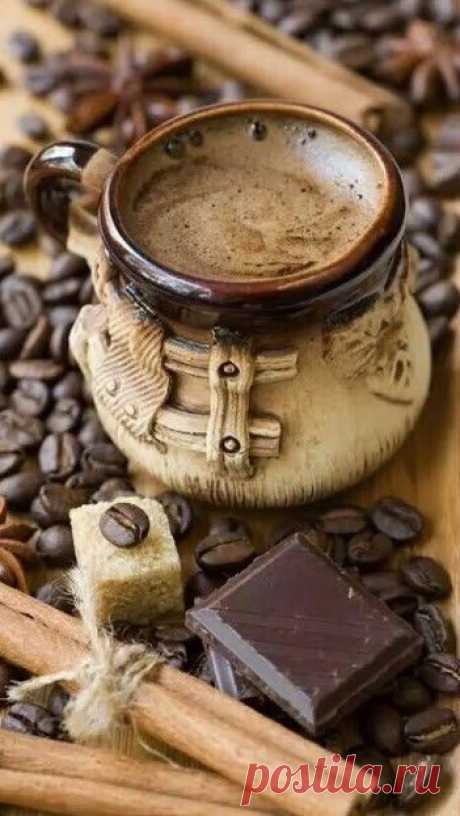 cup of coffee with spices and chocolate