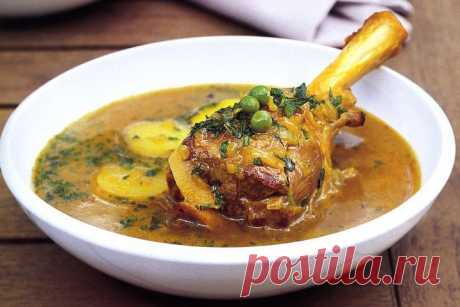 Lamb shanks in spiced potato and pea broth