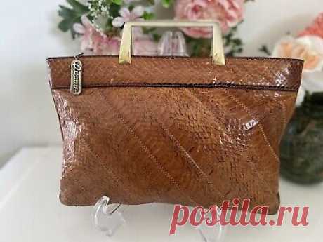 Vintage Caprice Leather Snakeskin Clutch Hand Bag Caramel Brown W Gold Hardware  | eBay Patch Work Details. Super cute and trendy. Gold tone hardware /Handle.  Zip closure. Logo zipper pull. Cream leather interior/ clean and good condition, Inside zip pocket. Interior slip pocket.