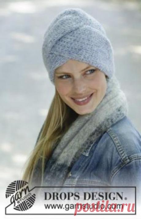 Шапка Гарбо Оригинальная шапка чалма, связанная на спицах 5 мм из Drops Air. Вязание шапки начинается с двух деталей, переплетающихся в центре...