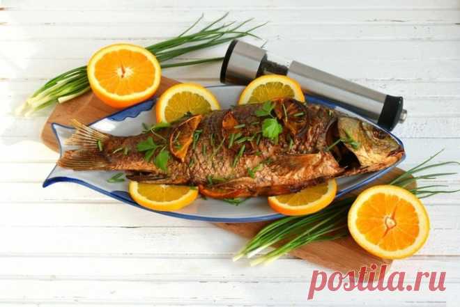 Сазан в духовке с апельсинами