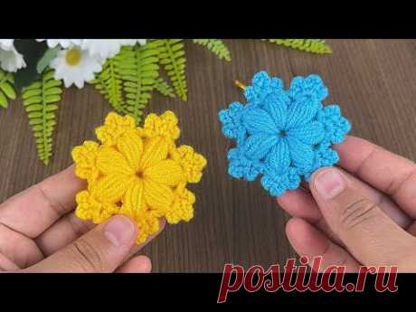 Watch how to make a simple pouf flower