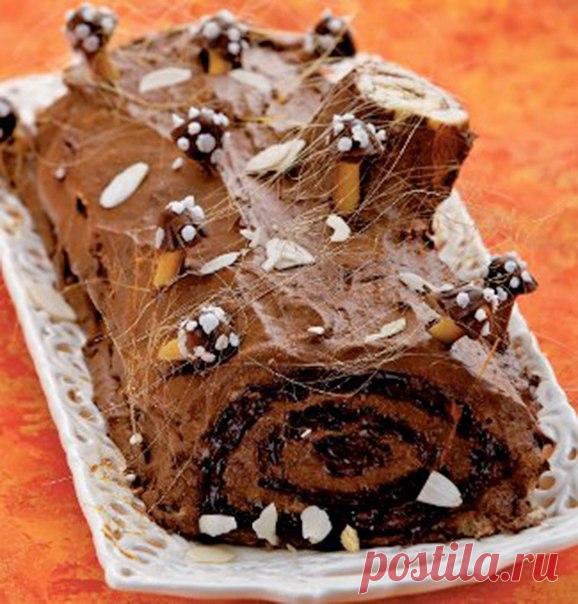 Торт Шоколадное полено 

Время готовки: 2 ч 30 мин. 
Количество порций: 8. 
Сложность приготовления: средняя. 

Ингредиенты: 
Какао-порошок – 2 ст. л. 
Яйцо – 5 шт. 
Масло сливочное – 1,5 ст. л. 
Сахар ванильный – 1 ч. л. 
Мука пшеничная – 2/3 стакана. 
Сахар – 1 стакан. 

Для декоративных «грибков»: 
Яйцо (белок) – 1 шт. 
Пудра сахарная – 2,5 ст. л. 

Для крема: 
Молоко – 5 ст. л. 
Шоколад белый – 75 г. 
Какао-порошок для украшения. 
Сахарная пудра для украшения. 
Масло с...