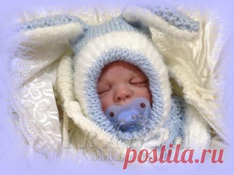 Шапочка-шлем для малыша &quot;Мой Зайка&quot;. Автор: Iranta.
Удобная, комфортная, теплая и очаровательная шапочка с манишкой и декоративными ушками!