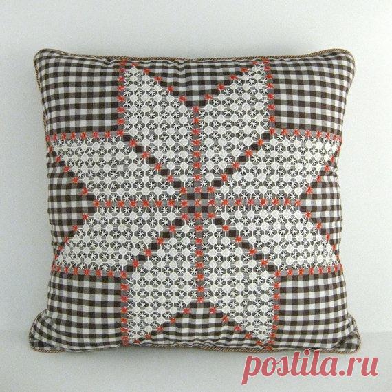 Вышивка на ткани в клетку