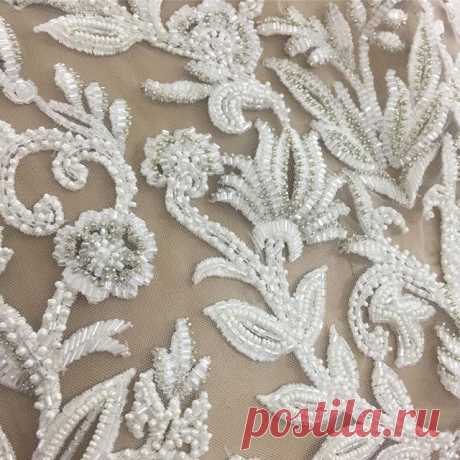 Heavy but subtile detail of the beading on a custom designed lace bridal bodice #bridetobe #handembroidery #custommade #beaded #silk #threadwork #lace #beadedlace #wedding #weddingdress #madetoorder #handmade #luxury #craftsmanship #artisanal #fashion #bridal #couture #couturedress #oneofakind