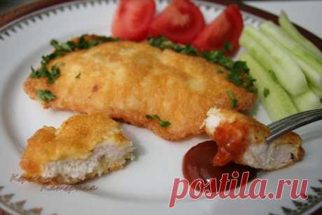 Нежная куриная отбивная в сырном кляре.   
Шустрый Повар