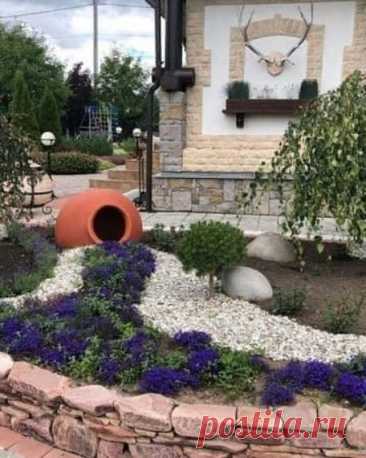 Кувшины и амфоры в дизайне клумб.