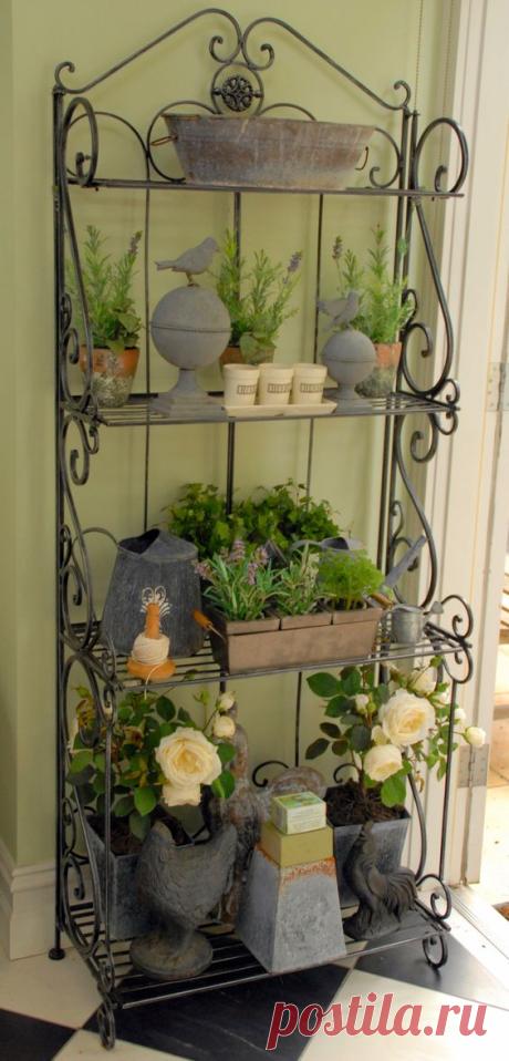 (300) I always like a wrought-iron bakers stand. I use this to house all my gardening bibs and bobs, little herb pots and my collection of grey tin pots,…