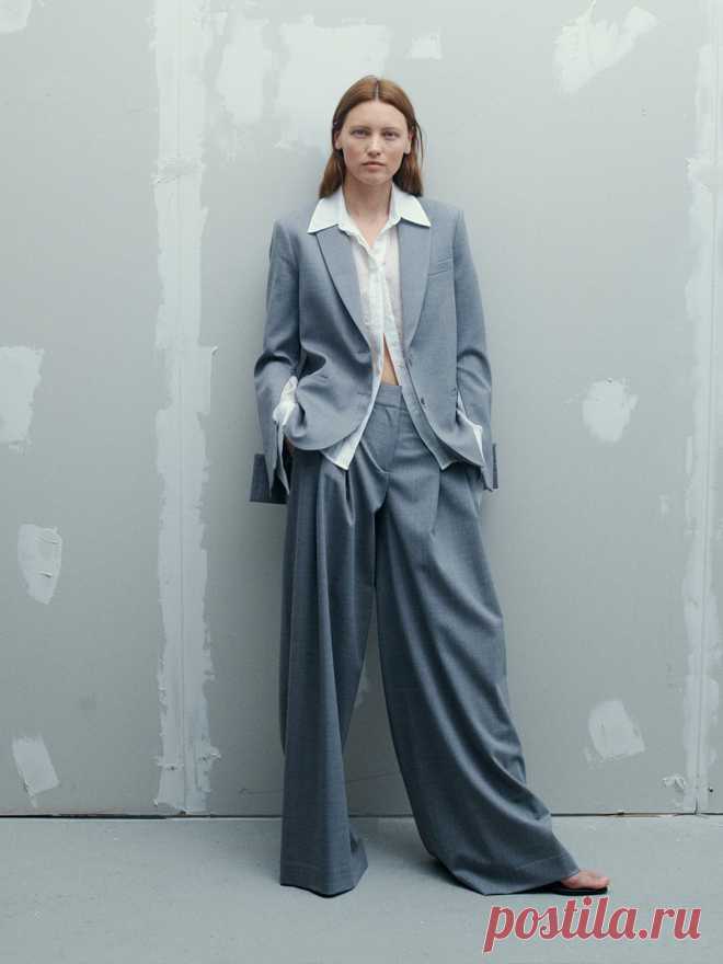 Boyfriend Blazer in Wool Twill The Boyfriend Blazer is crafted of stretch Italian wool twill to a slouchy single-breasted silhouette. This style features zipper cuffs and peak lapels. 97% wool, 3% elastane. 