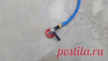 Smoothing hardened Vermiculite base. | ...So, I needed to smooth the transitions between pours, and smooth trowel marks, splashes of hardened VermiСrete, etc. My answer was to buy a concrete polisher... it makes very quick work of VermiСrete... the 50 grit is very agressive on Vermiculite. It also grinds away concrete easily too... I had a few spots where concrete had splashed on top of the VermiCrete. In this pic you can see the finished and raw parts of the floor... Very Effective!