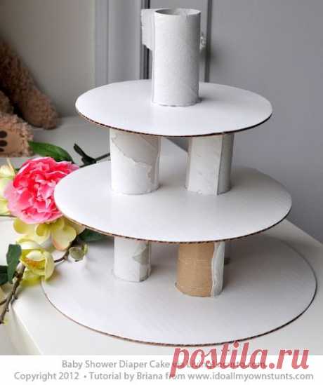 Learn how to make a diaper cake for a baby shower with this easy craft tutorial!