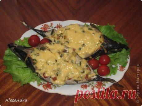 Скумбрия фаршированная овощами и сливками.