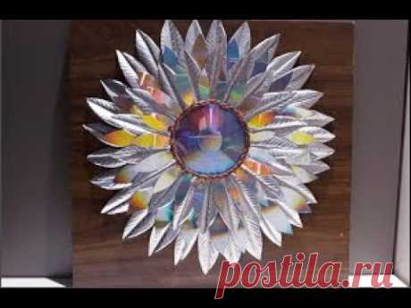 Decoração com materiais reciclados(DVD's e latinhas)