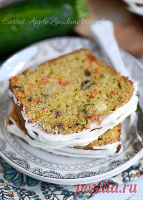 Carrot Apple Zucchini Bread - Mom On Timeout This Carrot Apple Zucchini Bread recipe is incredibly moist and flavorful! Vibrant colors from the carrot, apple, and zucchini make this bread irresistible!