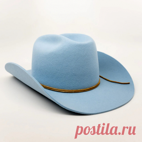 Big Sky Porter Inspired by the high-fashion western style and class of the 50’s, the porter style was born. The combination of the retro rolled short brim and cattleman crown make this a must-have staple, complimenting the elevated western style of today’s trends. Sky blue. Rolled retro brim. Cattleman crown. 4 3/4" crown, 3 1/2" bri