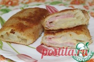 Капустные шницели "Сюрприз" - кулинарный рецепт

Капуста белокочанная	(маленький) — 1 вилок
Ветчина	(примерно) — 20 ломт.
Сыр голландский	(примерно) — 20 ломт.
Яйцо куриное	— 4 шт
Сухари панировочные	— 4 ст. л.
Соль	(по вкусу) — 1 ч. л.
Перец черный	(по вкусу) — 1 ч. л.
Масло растительное	(на глаз) — 0,5 стак.