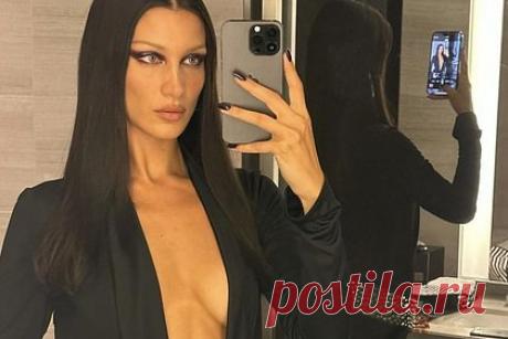 Белла Хадид снялась в наряде с глубоким декольте. Американская супермодель Белла Хадид снялась в откровенном наряде и порадовала фанатов. 25-летняя знаменитость разместила фото перед показом бренда Versace, который проходил в рамках Недели моды в Милане. На ней надето шелковое платье черного цвета, оформленное глубоким V-образным декольте.