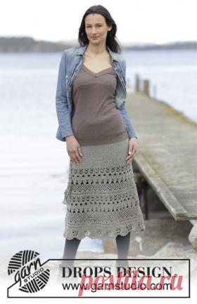 Юбка ниже колен с ажурными узорами