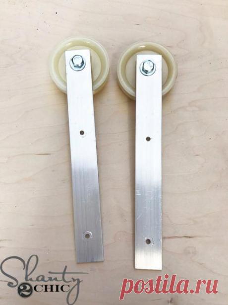 Build your own DIY Barn Door Hardware for $20! Watch the free how-to video as we take you step-by-step through the entire build at www.shanty-2-chic.com