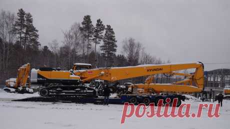 Демонтаж железобетонной конструкции экскаватором с гидравлическими ножницами