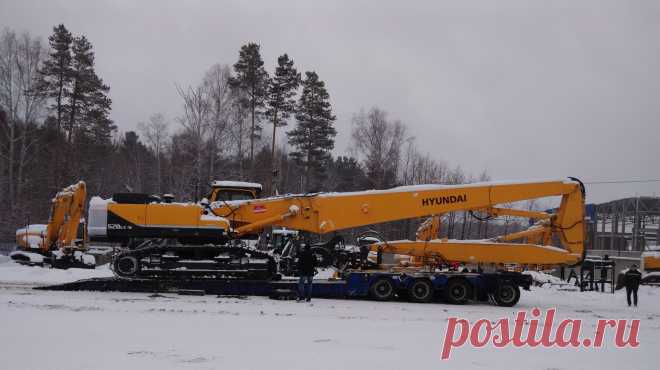 Демонтаж железобетонной конструкции экскаватором с гидравлическими ножницами