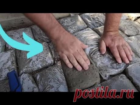 The Brilliant Reason He Lays Ziploc Bags of Cement in His Backyard