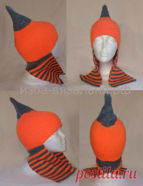 Осенняя или зимняя шапочка с ушками, которые могут выполнять функцию шарфа