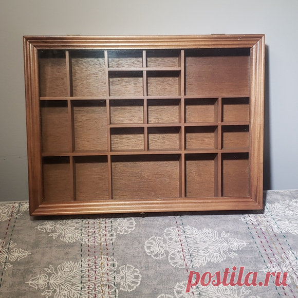 Vintage Wood & Glass Display Box Shop moosetradingco's closet or find the perfect look from millions of stylists. Fast shipping and buyer protection. Awesome used condition. 

Item is vintage Select Merchandise Company. 

Store all kinds of little knick knacks. 

Can be hung on the wall horizontal or vertically. Or can be set on a table. 

There are a couple of scratches on the wood. See pictures. 

Comes from a smoke free, labrador friendly home 🏡 🐶