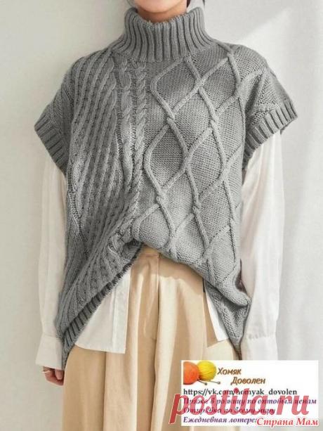 Объемная и длинная безрукавка светло-серого цвета Схему составила LenkomKnit  Объемная и длинная безрукавка светло-серого цвета с высоким теплым воротником - гольф. В этой модели есть "изюминка" - асимметричное расположение узоров.
