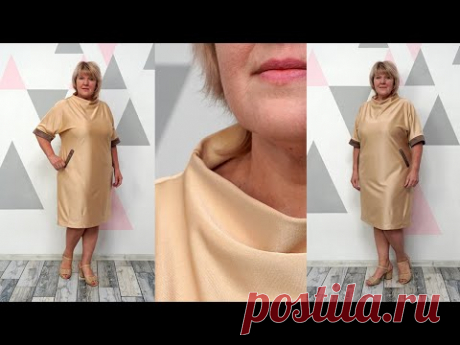 Модное платье с цельнокроеным рукавом и оригинальной горловиной. Платье простого кроя