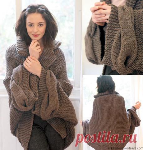 Кардиган с косами описание. Связать модный кардиган своими руками Роскошный кардиган-пальто спицами. Кардиган из толстой пряжи и широкими косами. Для вязания используйте описание.