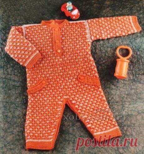 Вязаный крючком детский комбинезон с описанием.
 
Размер на 0-3 месяца.
 
Материалы: по 100 г тонкой акриловой пряжи кирпичного и бежевого цветов, 18 пуговиц в тон; крючок №2.5.
Показать полностью…