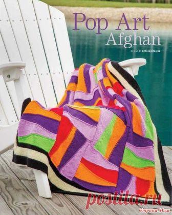 . Яркий жизнерадостный плед спицами Многоцветный плед в стиле печворк из квадратов с укороченными рядами. Размер 102 х 121 см Размер: 102 х 121 см.