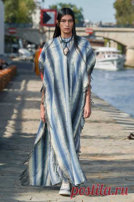Image may contain Clothing Apparel Footwear Shoe Fashion Cloak Human Person Poncho and Sleeve