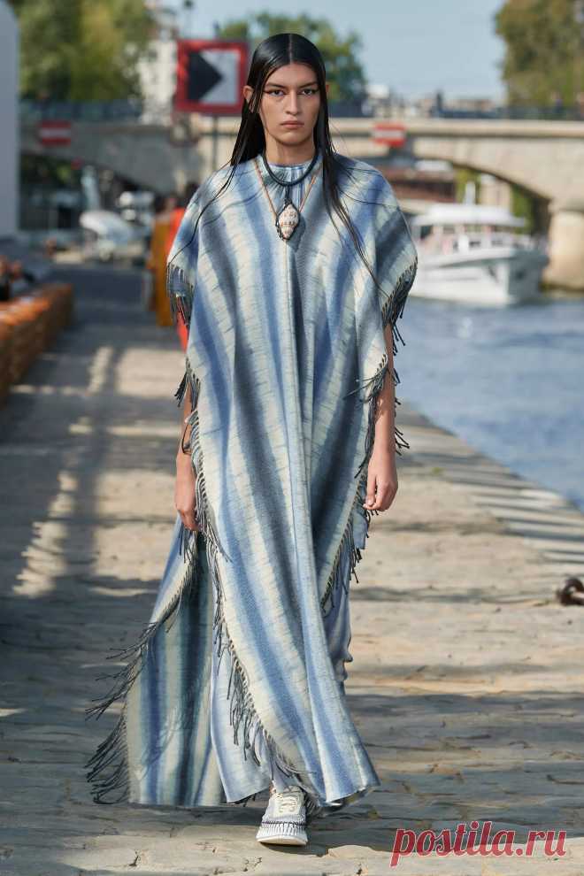 Image may contain Clothing Apparel Footwear Shoe Fashion Cloak Human Person Poncho and Sleeve