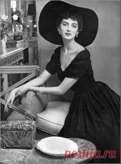 Carmen Dell' Orefice in late-day black dress of silk crêpe… | Flickr